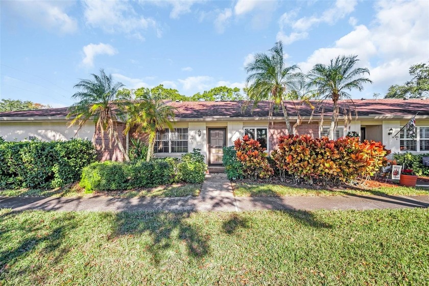 Welcome home to this beautifully updated villa in Villas on the - Beach Condo for sale in Palm Harbor, Florida on Beachhouse.com