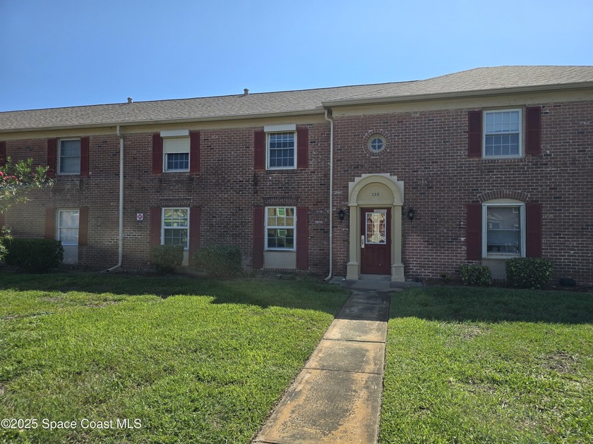 Live a short 5 minute walk to the beach! This 2 bedroom, 1 bath - Beach Condo for sale in Indian Harbour Beach, Florida on Beachhouse.com