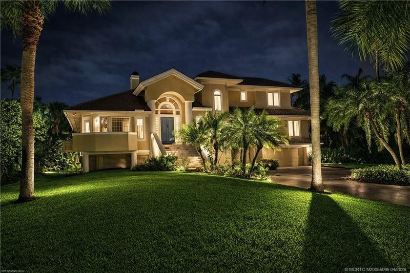 Framed by swaying palms and endless water views, this estate - Beach Home for sale in Stuart, Florida on Beachhouse.com