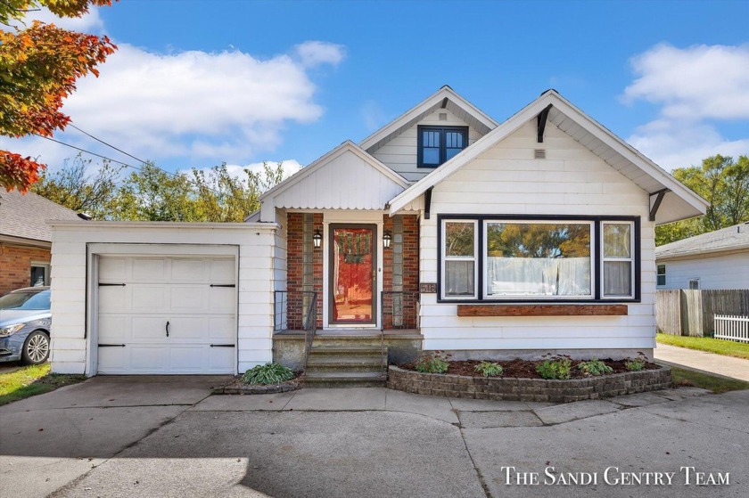 This beautifully remodeled Spring Lake home seamlessly combines - Beach Home for sale in Spring Lake, Michigan on Beachhouse.com