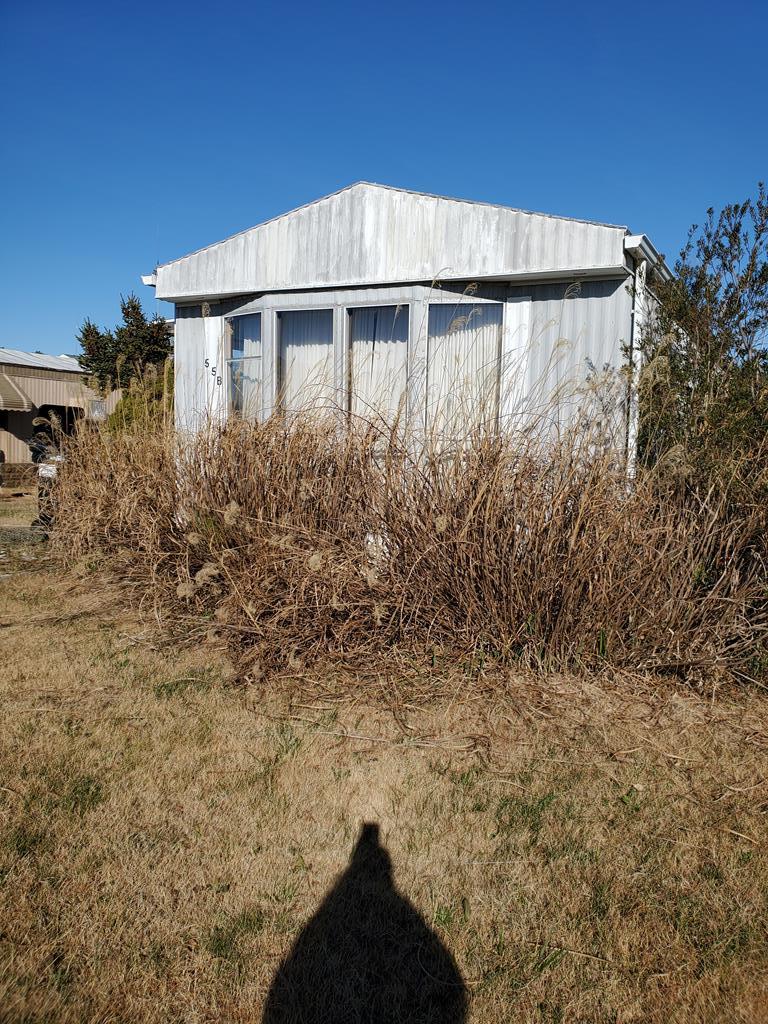 TLC needed for this 3BR/1 Bath island getaway with late fall to - Beach Home for sale in Chincoteague Island, Virginia on Beachhouse.com
