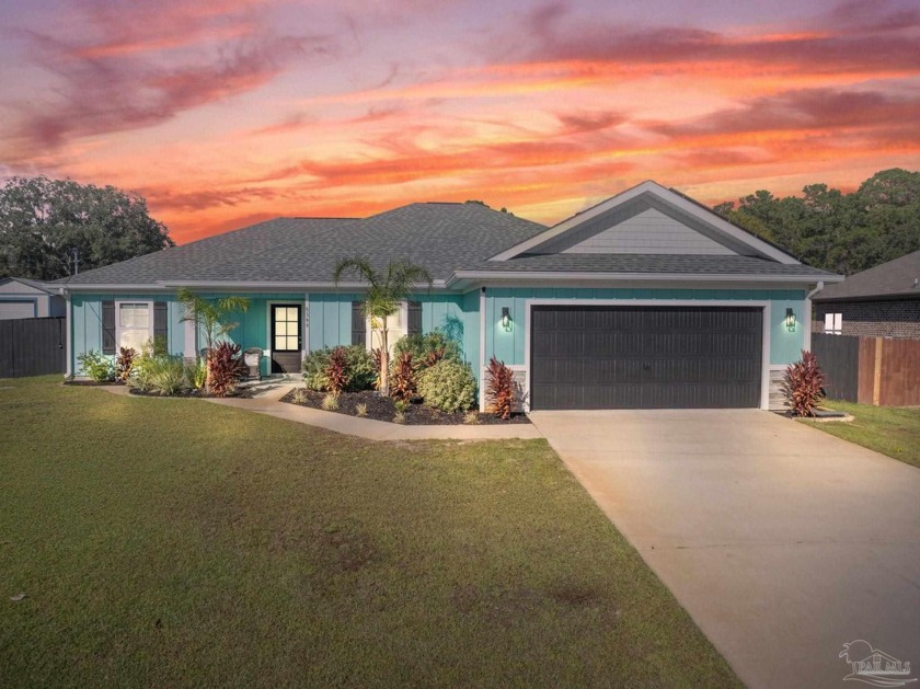 Built in 2020, this 4 bed/2 bath home with 2 car garage - Beach Home for sale in Gulf Breeze, Florida on Beachhouse.com