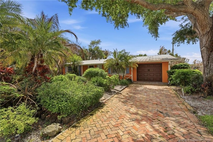 Step into this charming 3-bedroom, 3-bathroom single-family home - Beach Home for sale in Jensen Beach, Florida on Beachhouse.com