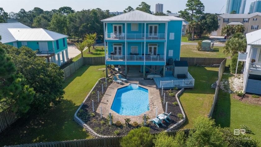 Discover the epitome of coastal living in this exquisite - Beach Home for sale in Orange Beach, Alabama on Beachhouse.com