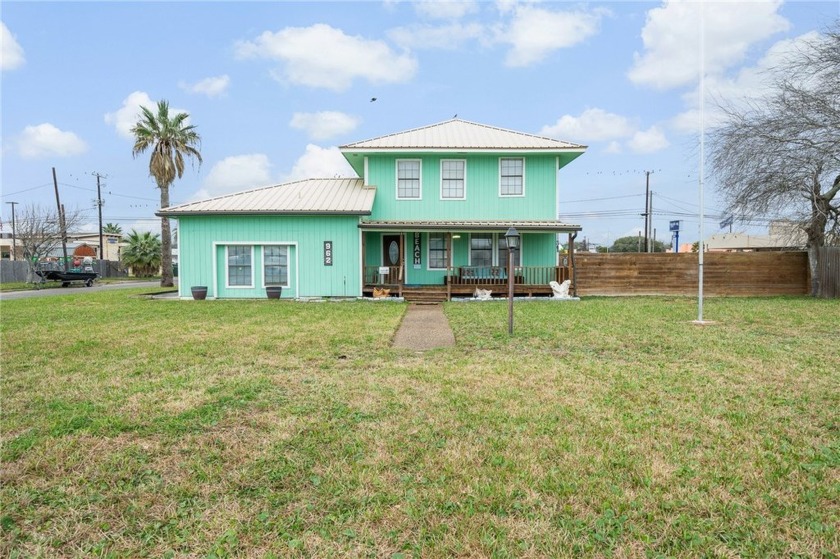 This beautifully updated two-story coastal home is perfectly - Beach Home for sale in Aransas Pass, Texas on Beachhouse.com