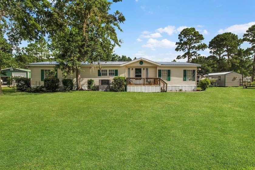 HOME, BOAT , GOLF CART AND MULTIPLE STORAGE BUILDINGS CAN BE ALL - Beach Home for sale in Townsend, Georgia on Beachhouse.com