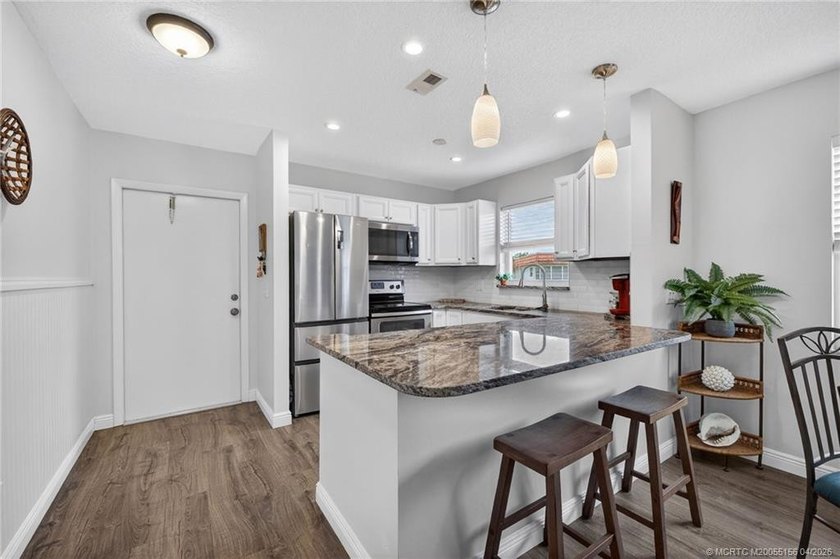 This lovely home has been exquisitely remodeled with a designers - Beach Condo for sale in Stuart, Florida on Beachhouse.com