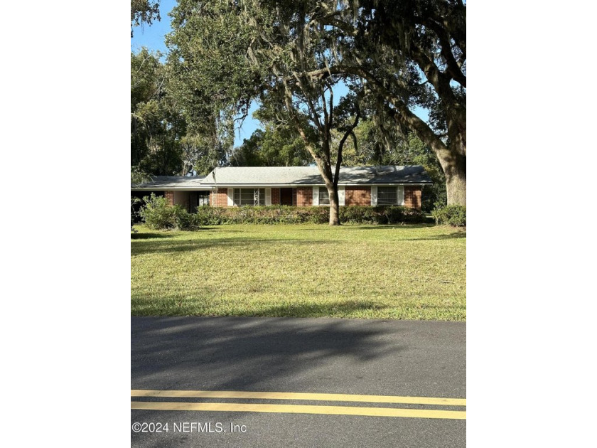 Beautiful setting on the Marsh and Tidal Creek, House is Brick - Beach Home for sale in Fernandina Beach, Florida on Beachhouse.com