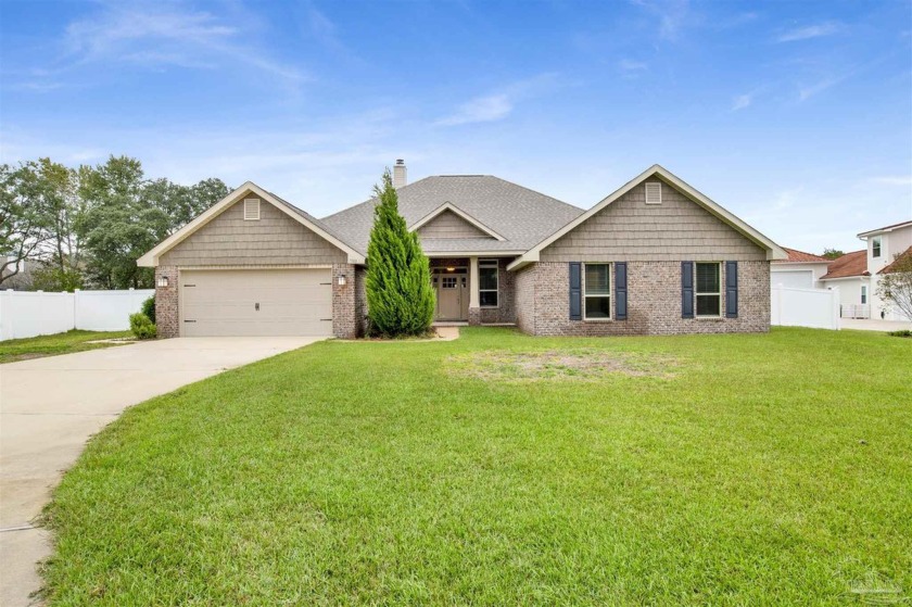 Welcome to this beautiful 4-bedroom, 2.5-bathroom home located - Beach Home for sale in Navarre, Florida on Beachhouse.com