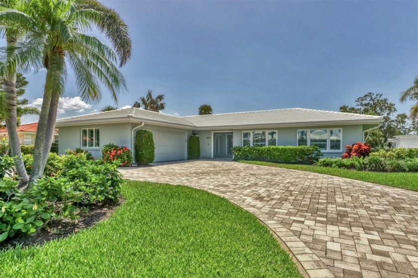 Welcome to your own piece of paradise in the prestigious Country - Beach Home for sale in Longboat Key, Florida on Beachhouse.com