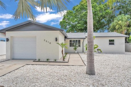 Still standing after two major hurricanes! Stunning modern 3/1/1 - Beach Home for sale in Largo, Florida on Beachhouse.com