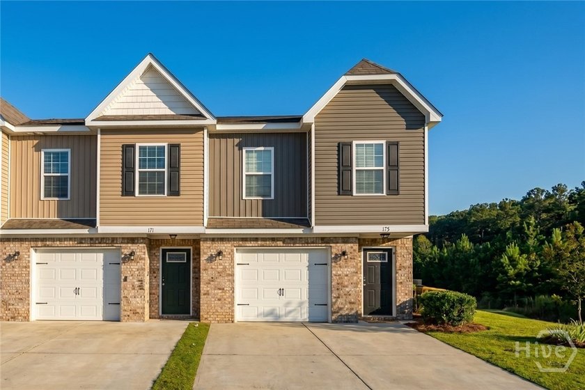 Located in a gated community in the heart of Richmond Hill, this - Beach Townhome/Townhouse for sale in Richmond Hill, Georgia on Beachhouse.com
