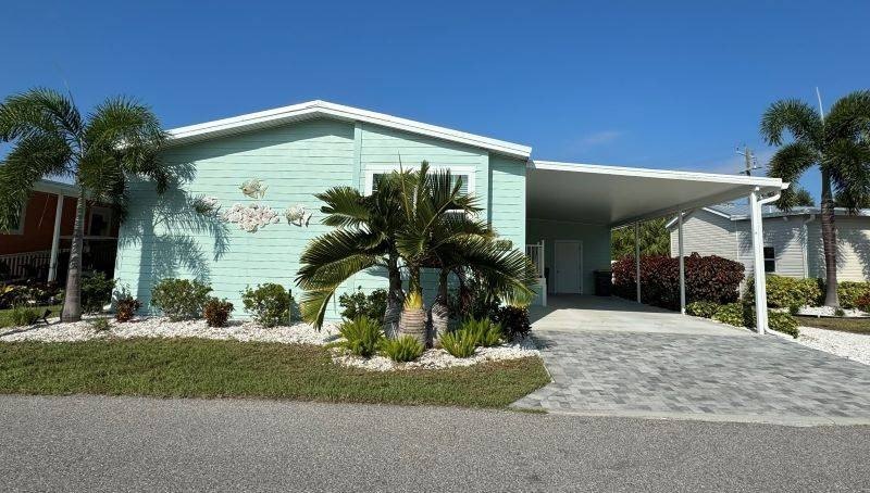 Discover this stunning 3-bedroom, 2-bathroom home in the - Beach Home for sale in Punta Gorda, Florida on Beachhouse.com