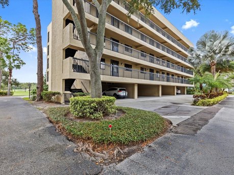 Discover the epitome of condominium living in this bright and - Beach Condo for sale in Tarpon Springs, Florida on Beachhouse.com