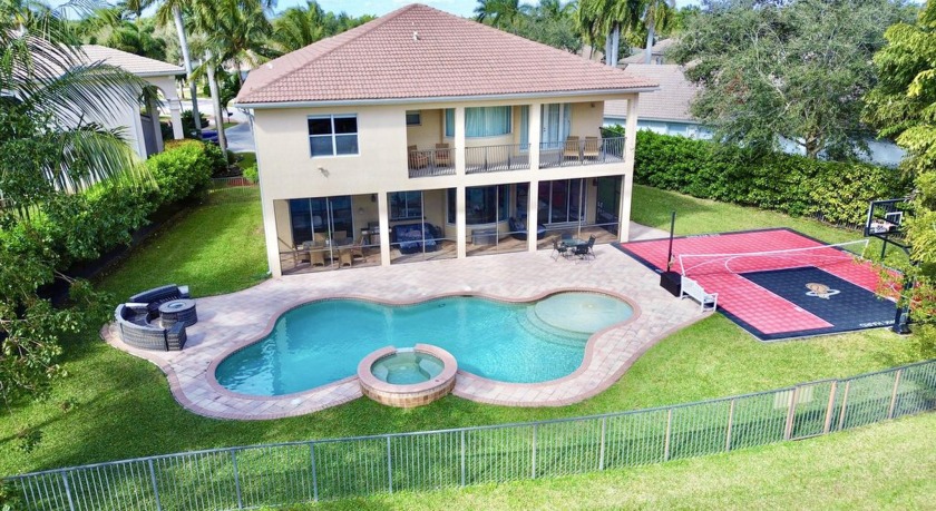 Set on an oversized, private cul-de-sac lot, this stunning - Beach Home for sale in Boynton Beach, Florida on Beachhouse.com