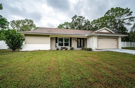 NO HOA!  NO CDD!  NOT IN A FLOOD ZONE!  NO DAMAGE FROM RECENT - Beach Home for sale in Spring Hill, Florida on Beachhouse.com