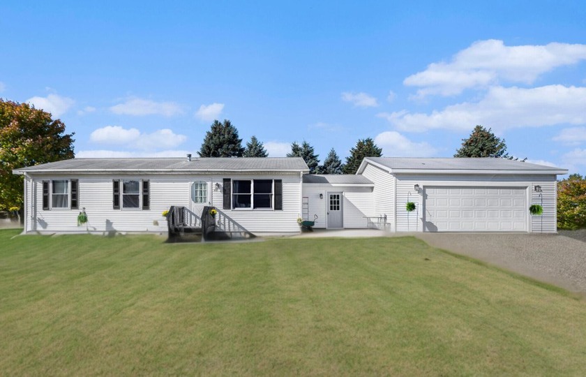 Welcome to this charming 3 bedroom ranch located at 1981 Kennedy - Beach Home for sale in Ludington, Michigan on Beachhouse.com