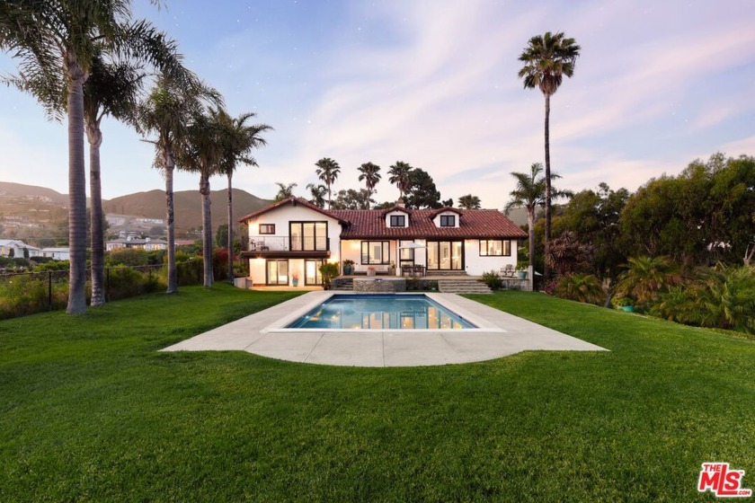 Set atop a private, elevated rolling knoll in prestigious Malibu - Beach Home for sale in Malibu, California on Beachhouse.com