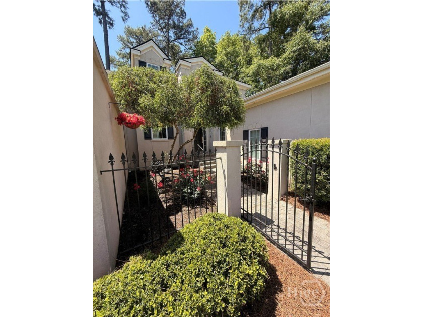 An exceptional townhome nestled within the gated enclave of - Beach Townhome/Townhouse for sale in Savannah, Georgia on Beachhouse.com