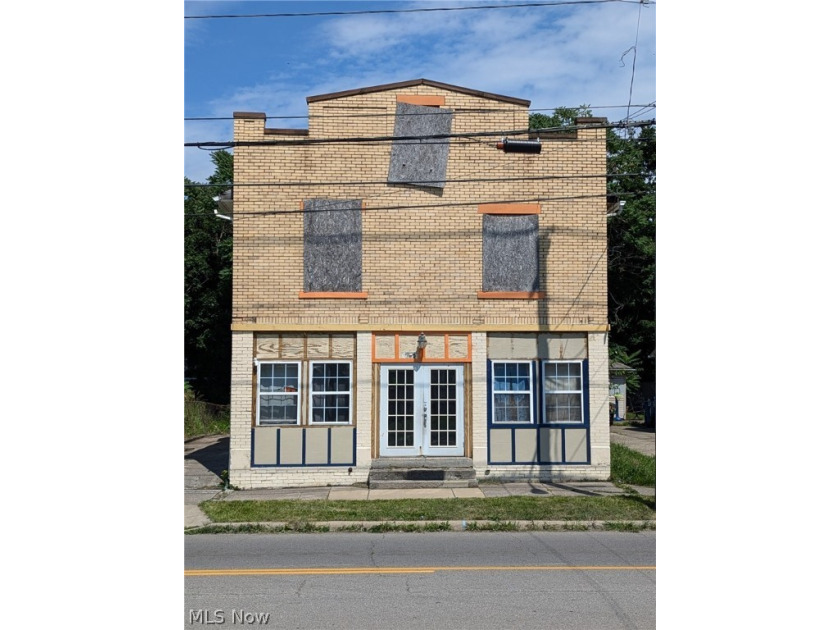 Discover the potential of this roomy brick double, boasting 2600 - Beach Townhome/Townhouse for sale in Lorain, Ohio on Beachhouse.com