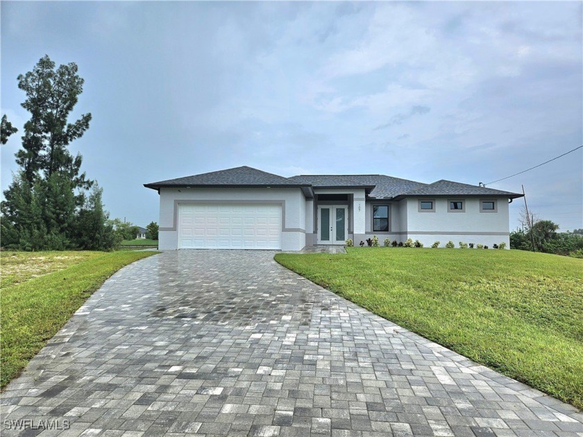 INTERSECTING CANAL with SEAWALL!!! NEW CONSTRUCTION 4 BRM POOL - Beach Home for sale in Cape Coral, Florida on Beachhouse.com