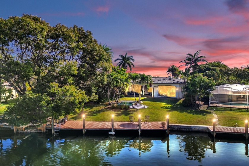 Situated on an expansive 19k sq-ft waterfront lot, this private - Beach Home for sale in Fort Lauderdale, Florida on Beachhouse.com