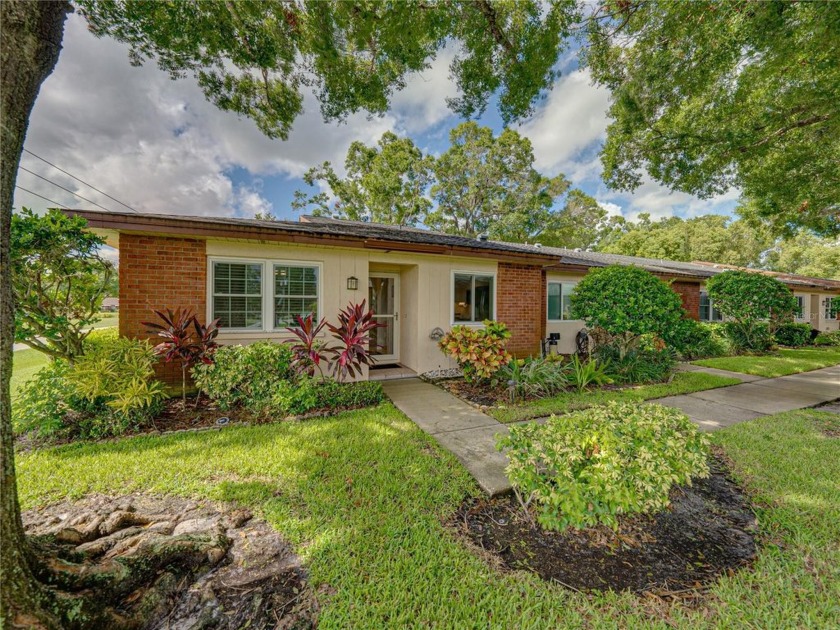 Welcome home to this stunning property located in Villas on the - Beach Home for sale in Palm Harbor, Florida on Beachhouse.com