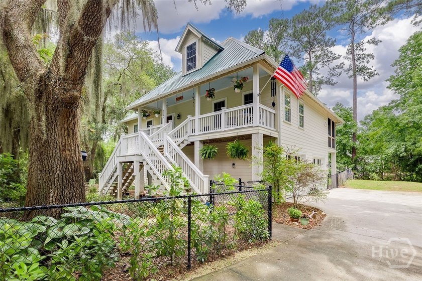 Tucked beneath swaying oaks and draped in coastal charm, 3120 - Beach Home for sale in Midway, Georgia on Beachhouse.com