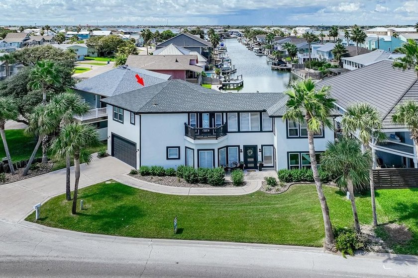 Experience waterfront living in this beautiful canal-front home - Beach Home for sale in Rockport, Texas on Beachhouse.com
