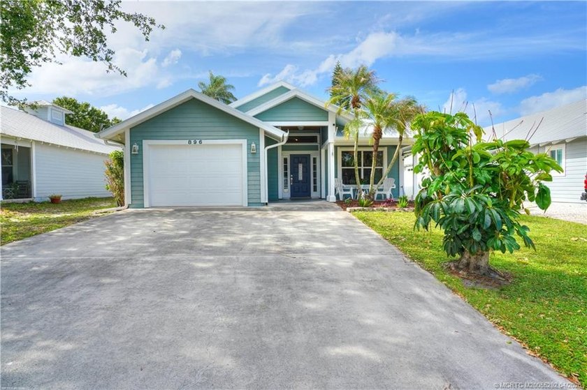 Welcome to this charming 3-bedroom, 2-bathroom home in the - Beach Home for sale in Palm City, Florida on Beachhouse.com