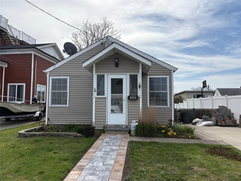 Your Waterfront Cottage awaits!!  Adorable and Updated Two - Beach Home for sale in Copiague, New York on Beachhouse.com
