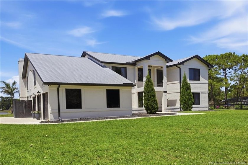 Experience privacy and luxury in one of Palm City's most - Beach Home for sale in Palm City, Florida on Beachhouse.com