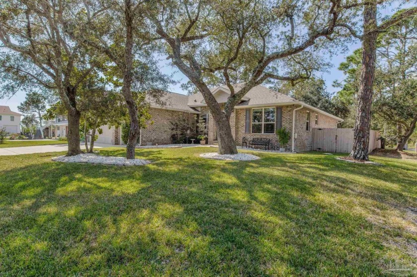 Nestled in the heart of a beautifully gated community on - Beach Home for sale in Pensacola, Florida on Beachhouse.com