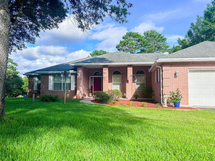 This Randy Wise custom built brick home nestled in Rocky Bayou - Beach Home for sale in Niceville, Florida on Beachhouse.com