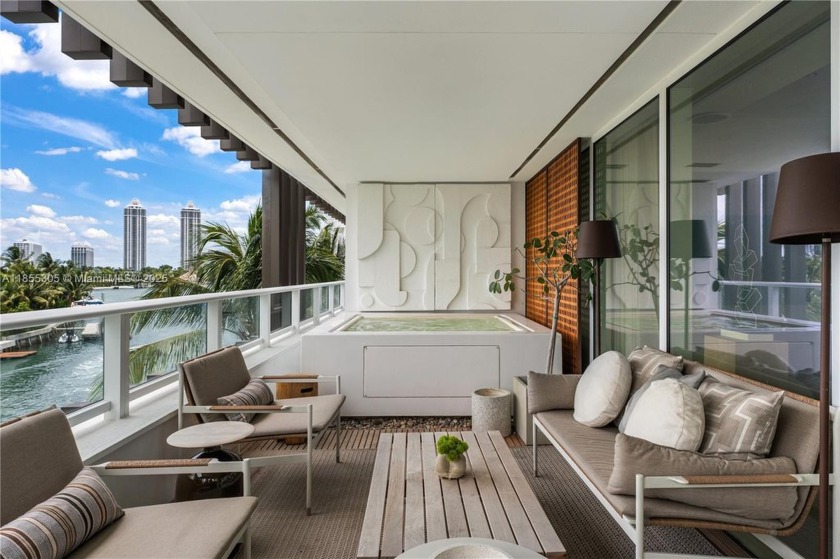 Discover refined waterfront living at The Ritz Carlton - Beach Condo for sale in Miami Beach, Florida on Beachhouse.com