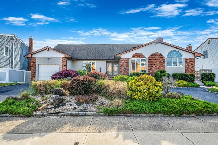 Live the dream on this rare 80-foot-wide waterfront property!  A - Beach Home for sale in Oceanside, New York on Beachhouse.com
