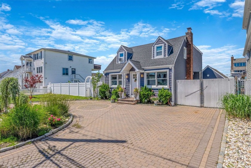 Discover the perfect waterfront retreat at 29 Mitchell Ave - Beach Home for sale in Babylon, New York on Beachhouse.com