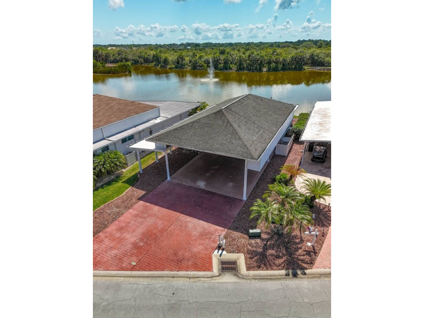 This beautiful port measures 25'x50'x13' to accommodate the - Beach Home for sale in Titusville, Florida on Beachhouse.com