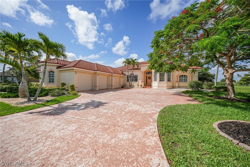 Welcome to your exclusive haven in the gated enclave of Diamond - Beach Home for sale in Punta Gorda, Florida on Beachhouse.com