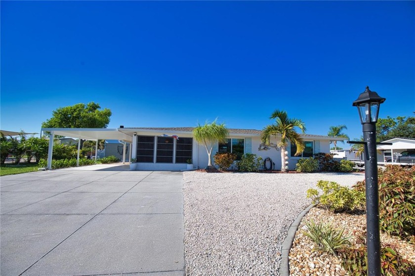 New Listing - Gulf Access Canal Home with Heated Pool! Welcome - Beach Home for sale in Englewood, Florida on Beachhouse.com