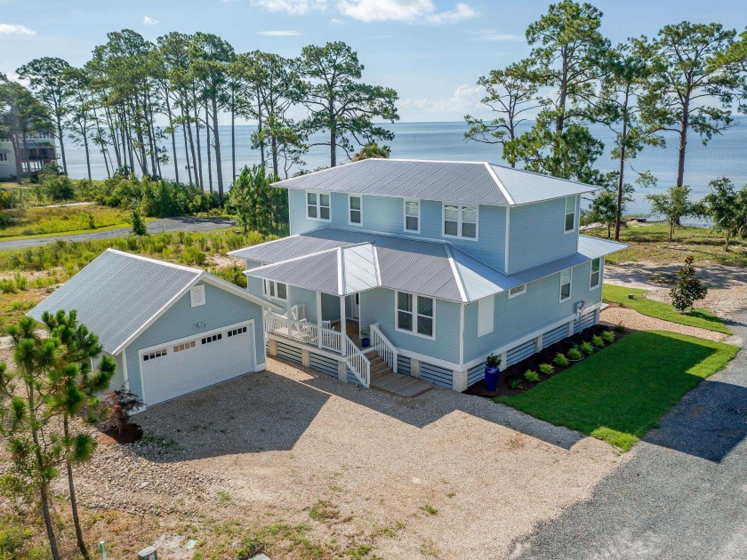 WOW! GULF-FRONT custom built 4 bedroom/3 bath home situated on - Beach Home for sale in Sopchoppy, Florida on Beachhouse.com