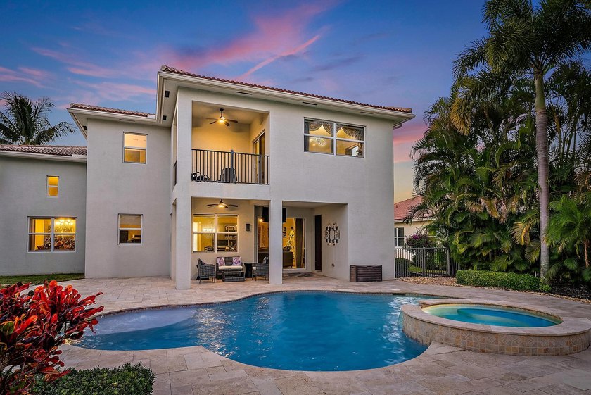 Welcome to this exceptional lakefront pool home in the highly - Beach Home for sale in Jupiter, Florida on Beachhouse.com