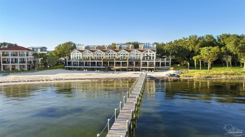 Behind a private wall you'll find this secluded beach-front - Beach Home for sale in Gulf Breeze, Florida on Beachhouse.com