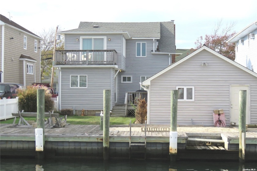 Waterfront - Classic 3 Bedroom Colonial 5 Houses From Bay On - Beach Home for sale in Amityville, New York on Beachhouse.com