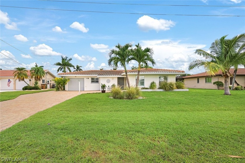 Welcome to this stunning 3-bedroom, 2-bathroom Direct Gulf - Beach Home for sale in Cape Coral, Florida on Beachhouse.com