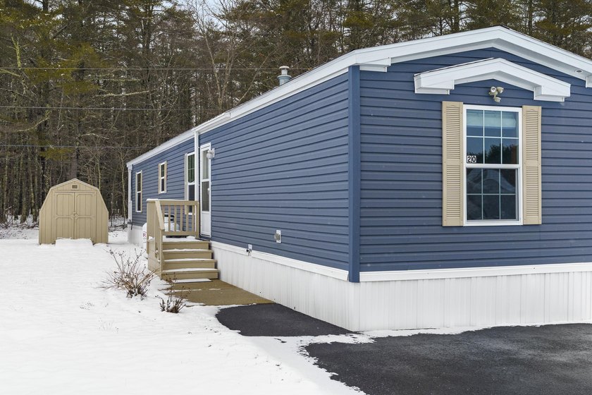 Tucked at the edge of the woods, this 3-bedroom, 2-bath home at - Beach Home for sale in Brunswick, Maine on Beachhouse.com