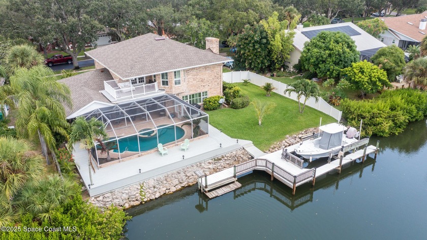 Exquisite canal front residence in the amazing Windward Cove - Beach Home for sale in Indian Harbour Beach, Florida on Beachhouse.com