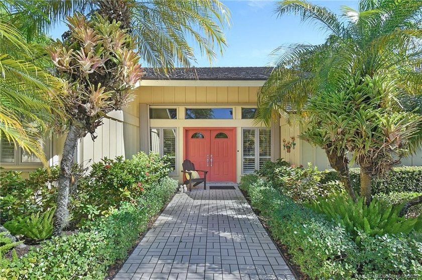 Charming 3BR, 2BA, 2CG +cart home is perfectly situated on a - Beach Home for sale in Stuart, Florida on Beachhouse.com