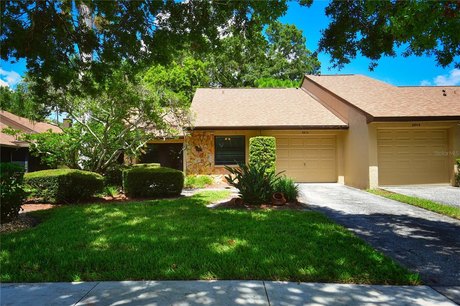 Prepare to be impressed with this THREE-bedroom villa.  Located - Beach Home for sale in Largo, Florida on Beachhouse.com