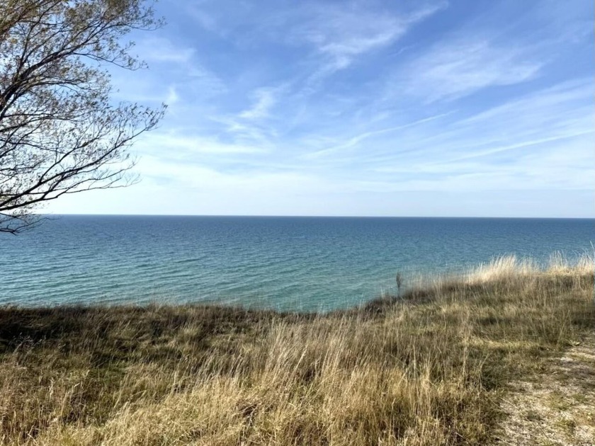 Discover the perfect canvas for your future cottage on this 1.12 - Beach Lot for sale in Manistee, Michigan on Beachhouse.com